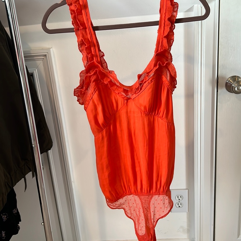 Free people orange frill bodysuit size M